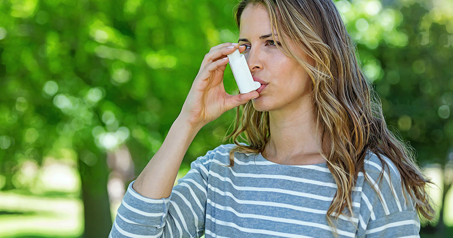 Woman Using Asthma Inhaler Ngst Media